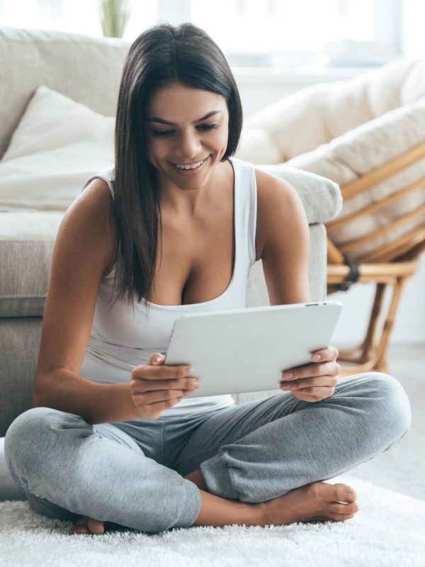 examining-her-brand-new-tablet-.jpg